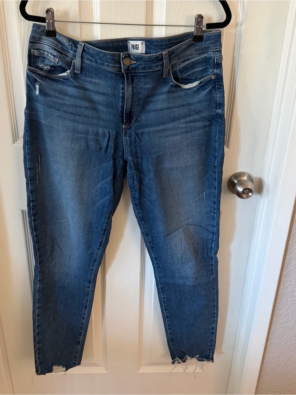 Medium Blue Distressed Ankle Jeans